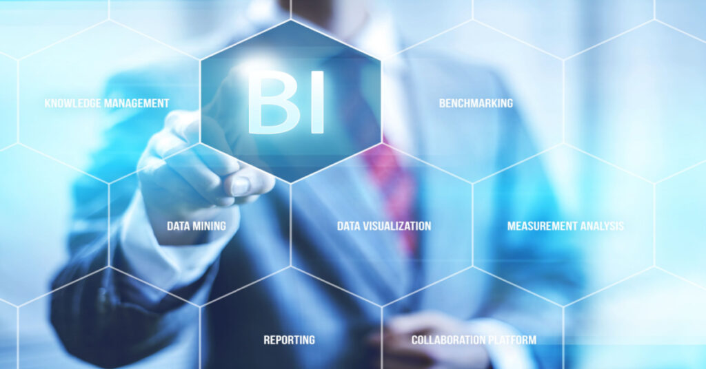 Business Intelligence concept – man selecting BI on a computer screen